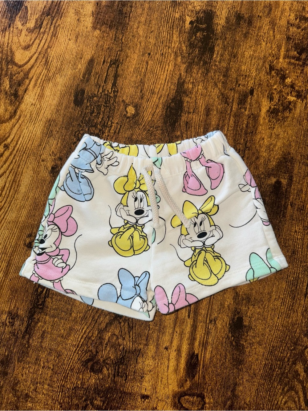Zara White Minnie Mouse Bow Print Shorts in Pastel Yellow, Pink, Blue